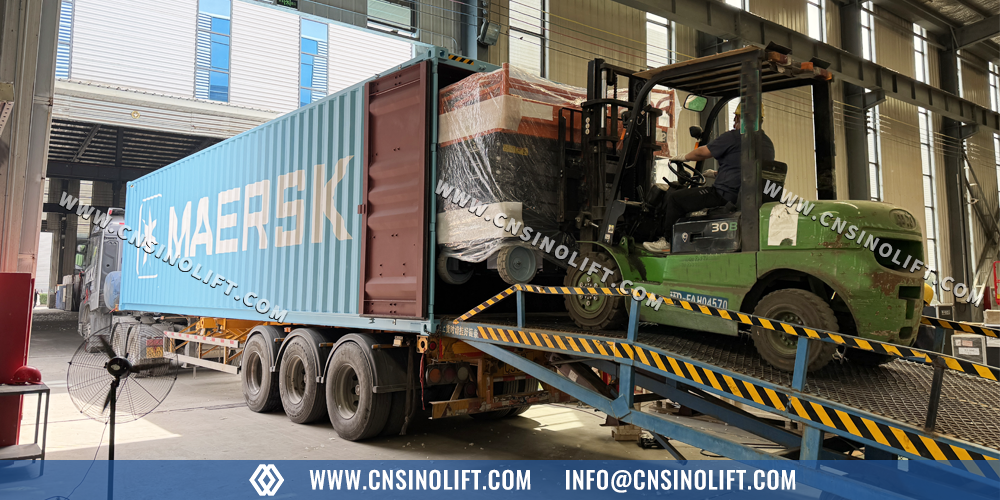Scissor lift container loading for export